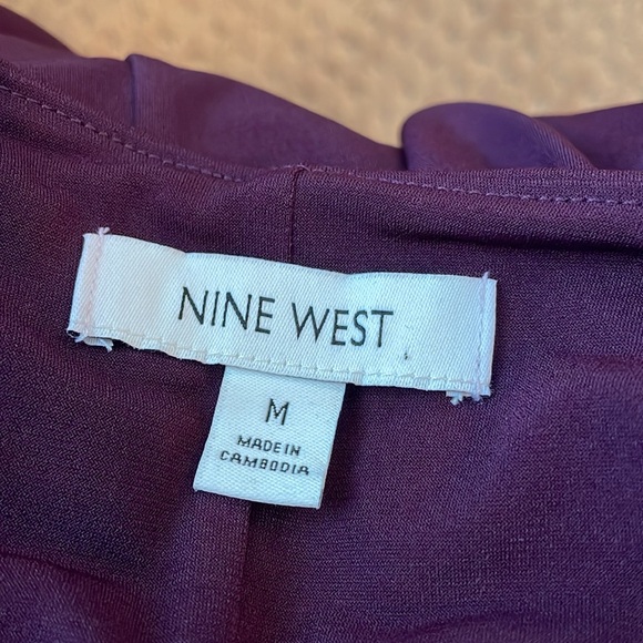 Nine West Medium plum colored sleeveless swing dress.Easy peasy pull over style. - Picture 5 of 6